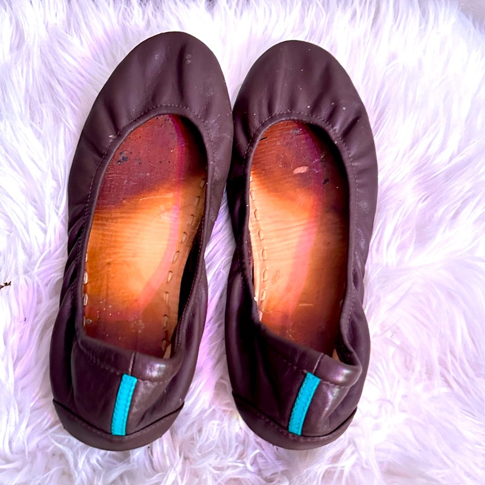 Tieks chocolate brown ballet flats.